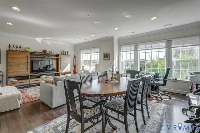 a view of a dining room with furniture window and outside view