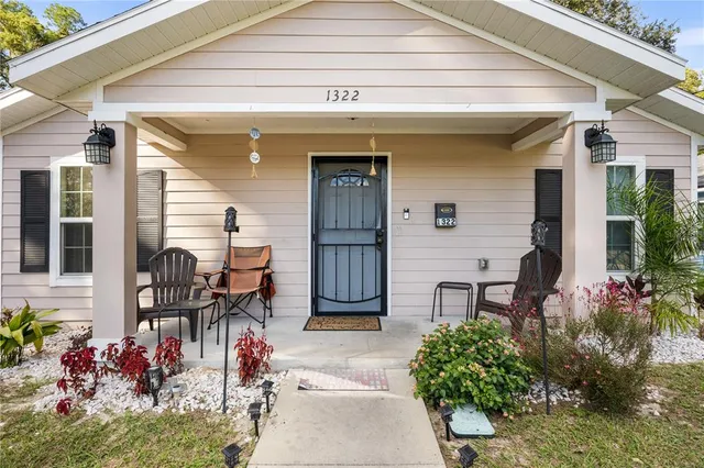 front view of a house with chairs