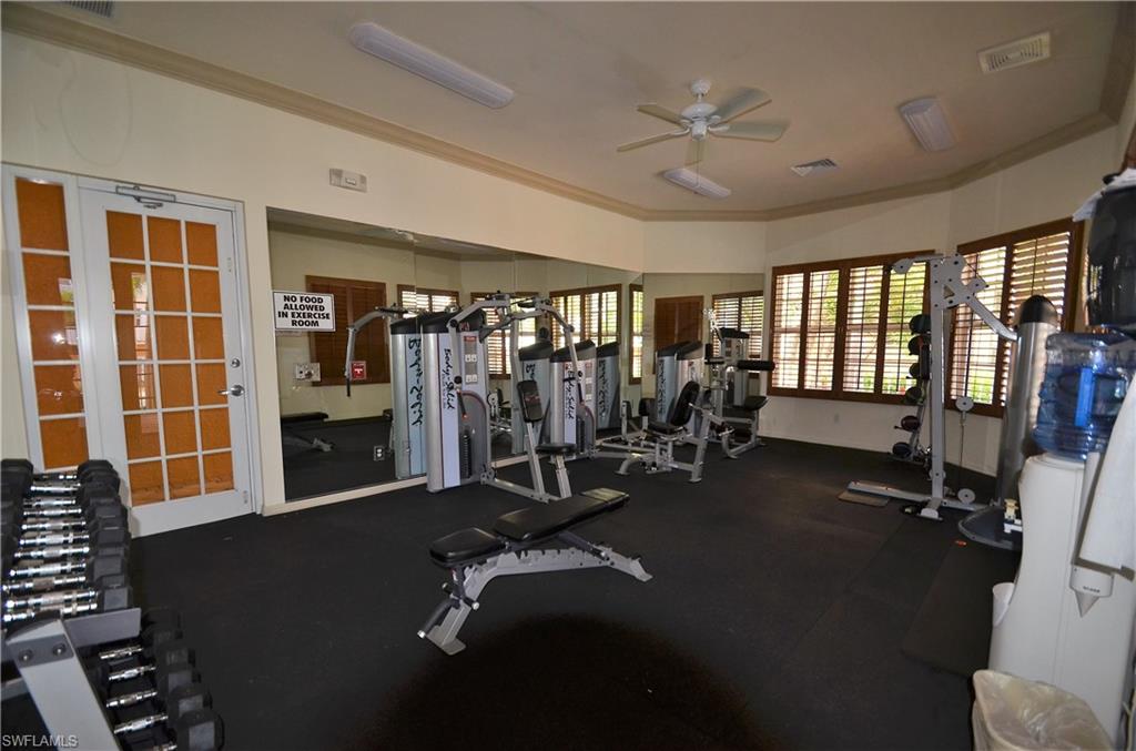 470 Launch Circle, Unit V503 Naples, FL 34108 - Photo 25 of 30 a view of a room with gym equipment