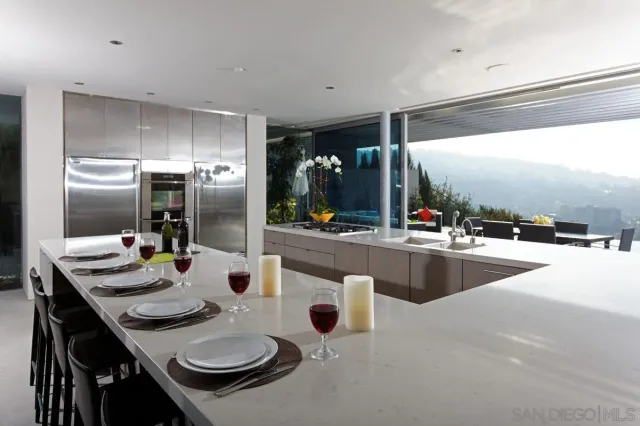 a view of a balcony with chairs