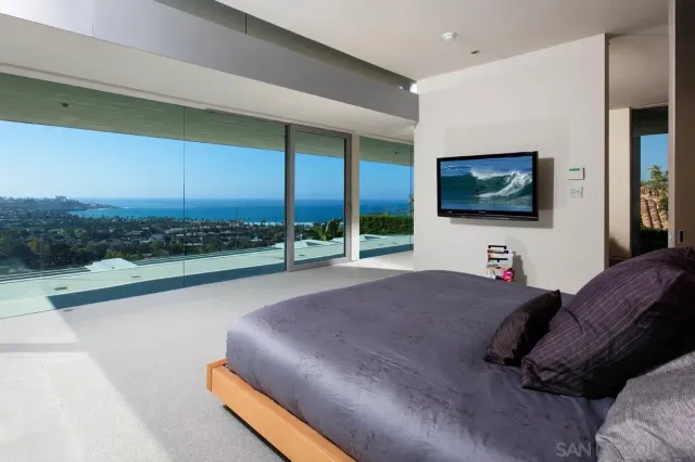 a kitchen with a sink and potted plant