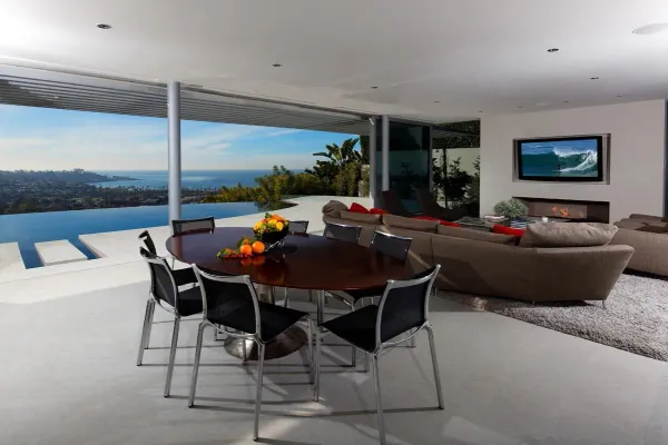 a kitchen with a table and chairs in it