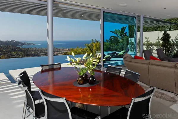 a kitchen with stainless steel appliances kitchen island granite countertop a sink and cabinets