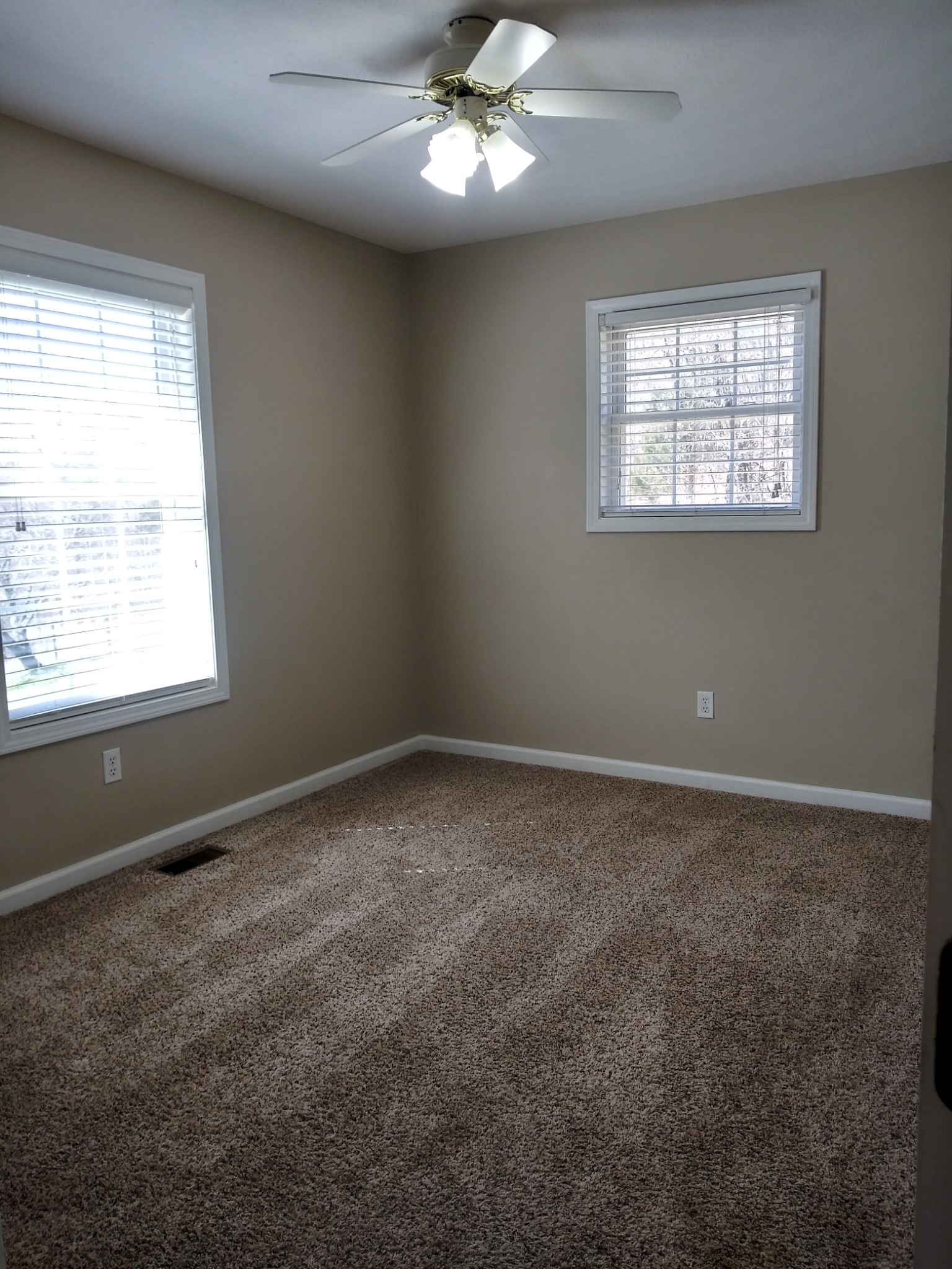 5330 Long Branch Road Tennessee Ridge, TN 37178 - Photo 14 of 57 a view of an empty room with a window
