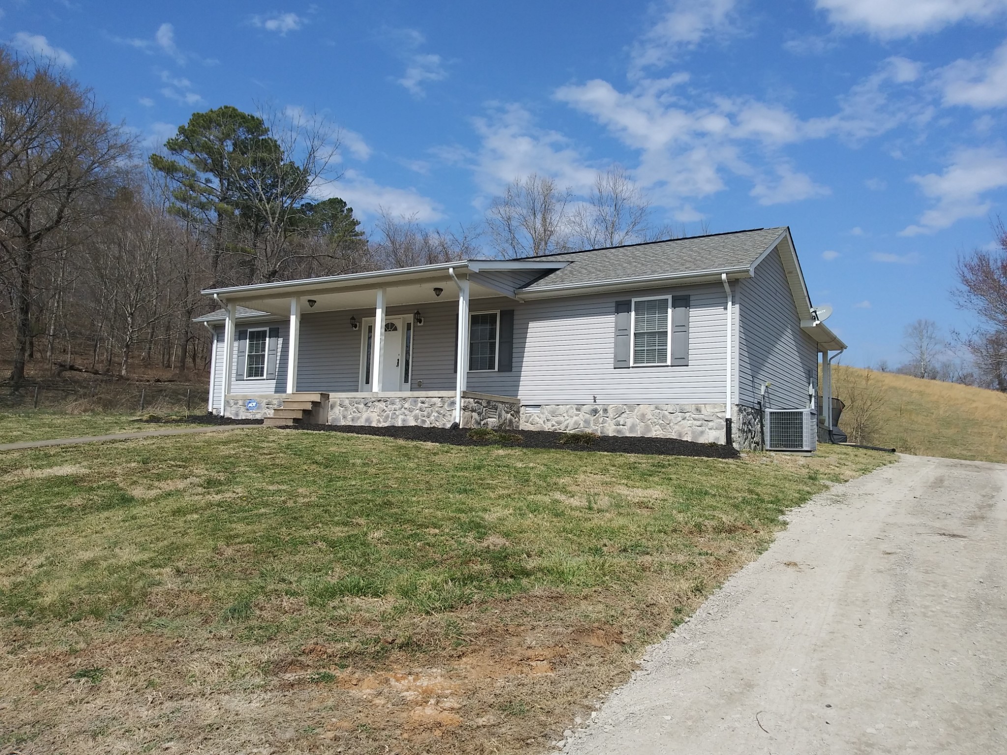 5330 Long Branch Road Tennessee Ridge, TN 37178 - Photo 2 of 57 a front view of house with yard