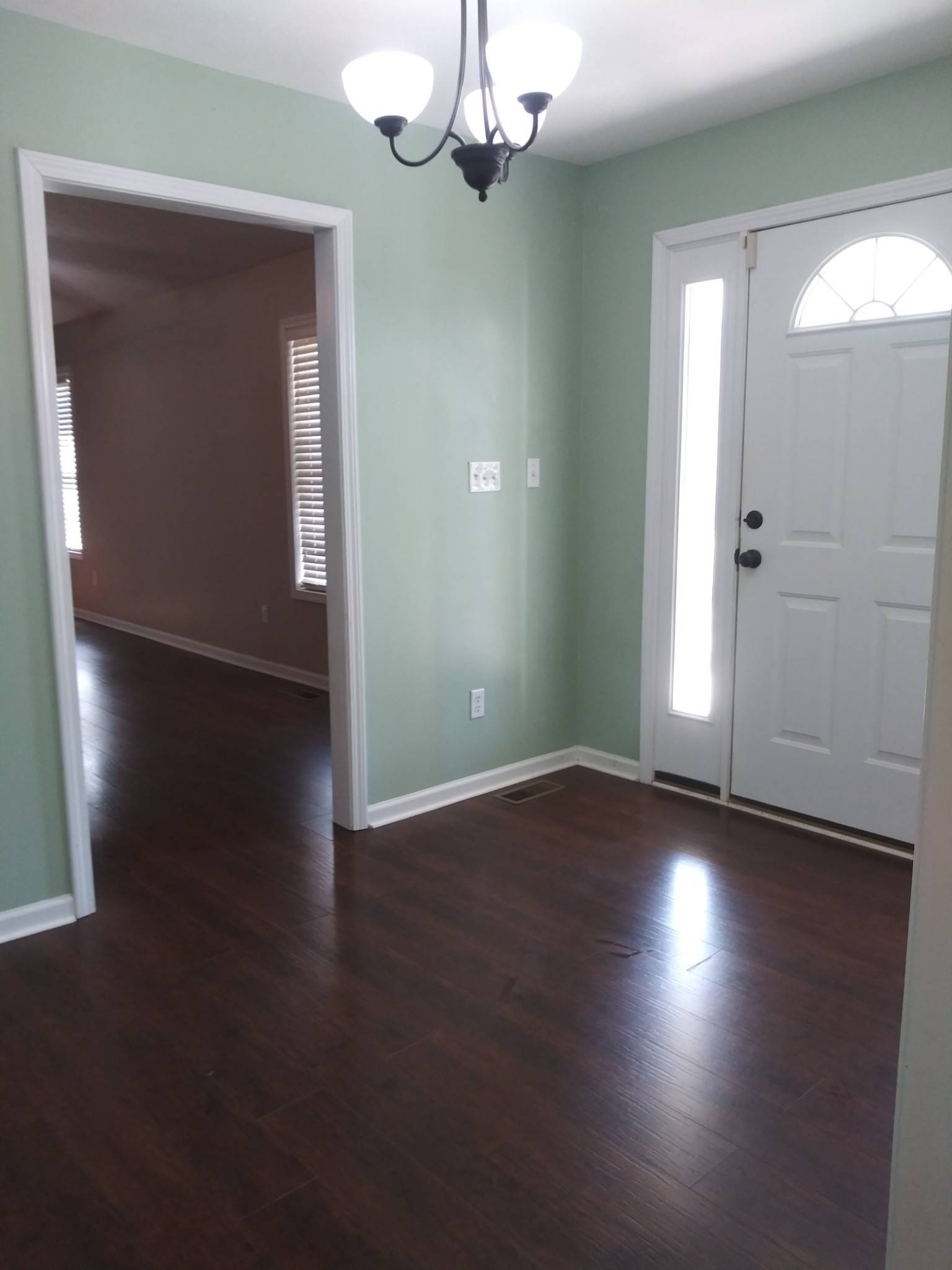 5330 Long Branch Road Tennessee Ridge, TN 37178 - Photo 21 of 57 an empty room with wooden floor and windows