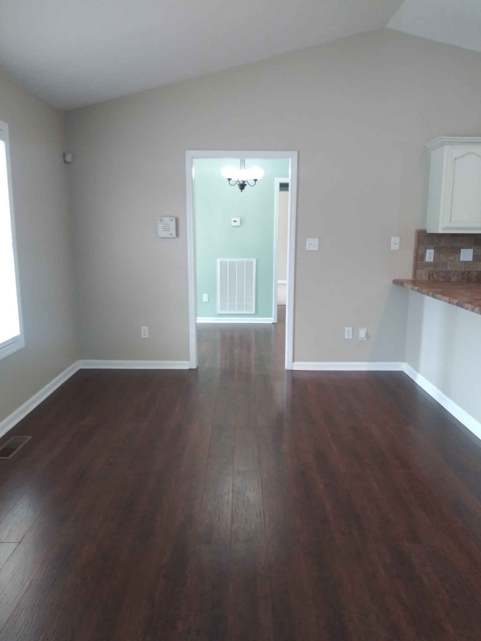 5330 Long Branch Road Tennessee Ridge, TN 37178 - Photo 32 of 57 a view of wooden floor and windows in a room