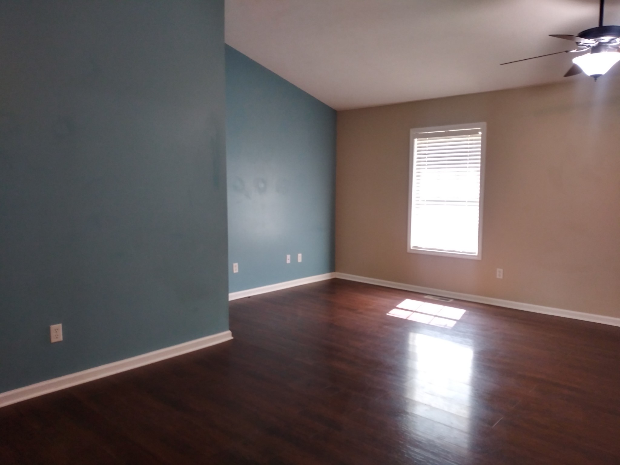 5330 Long Branch Road Tennessee Ridge, TN 37178 - Photo 33 of 57 a view of an empty room with wooden floor and a window