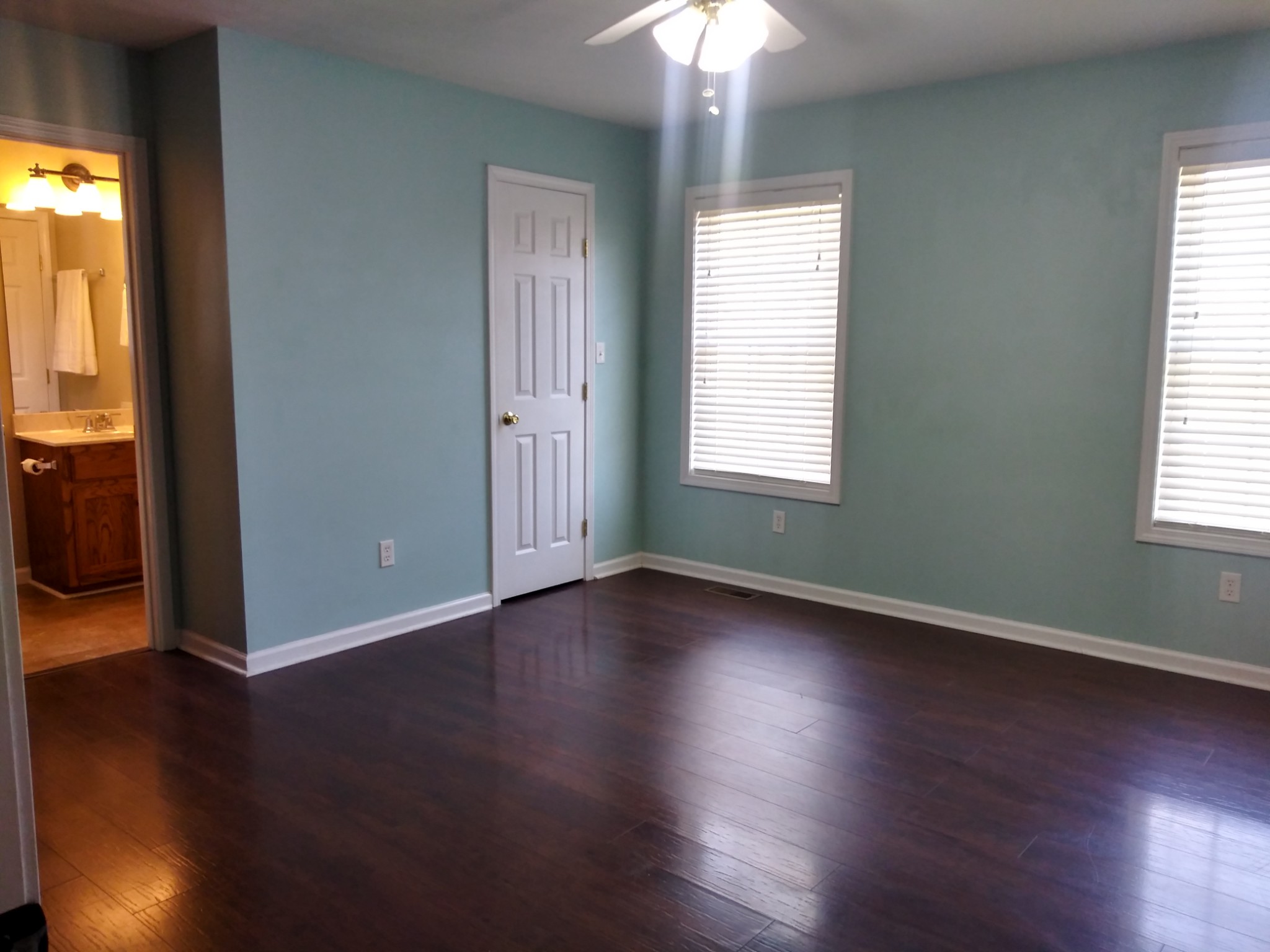 5330 Long Branch Road Tennessee Ridge, TN 37178 - Photo 34 of 57 an empty room with wooden floor and windows