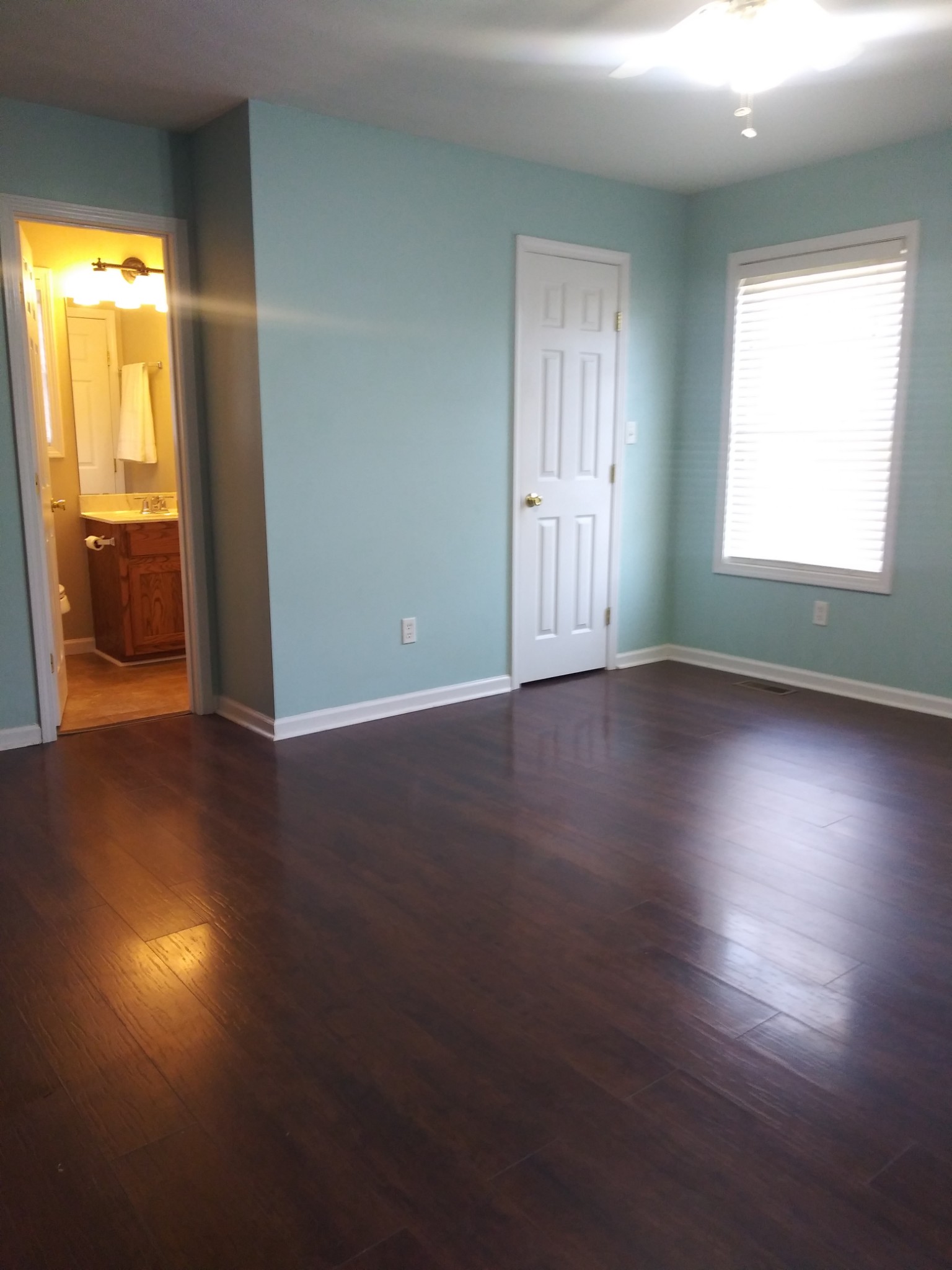 5330 Long Branch Road Tennessee Ridge, TN 37178 - Photo 35 of 57 an empty room with wooden floor and windows