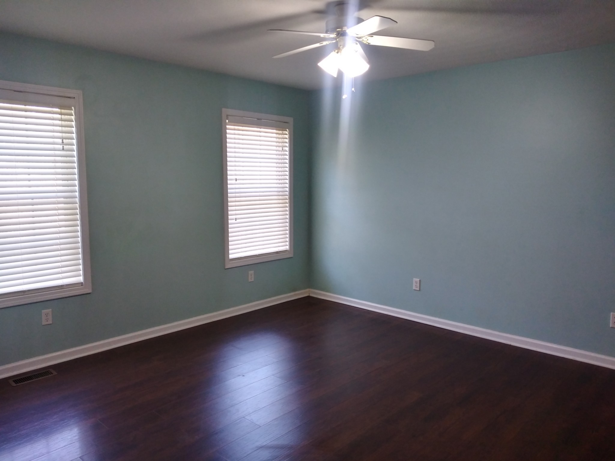 5330 Long Branch Road Tennessee Ridge, TN 37178 - Photo 37 of 57 a view of an empty room with wooden floor and a window