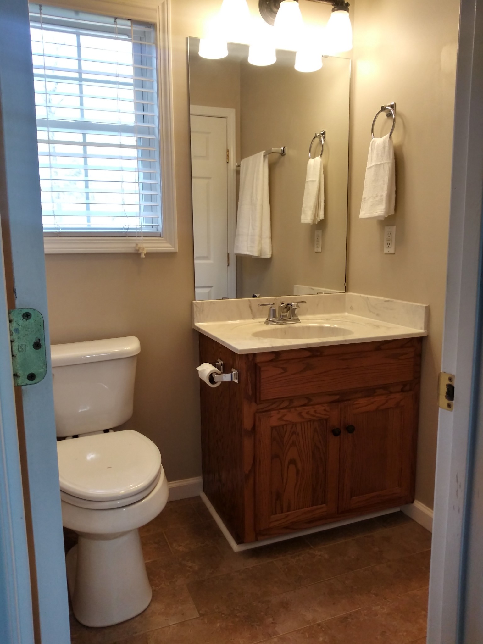 5330 Long Branch Road Tennessee Ridge, TN 37178 - Photo 39 of 57 a bathroom with a toilet sink and mirror