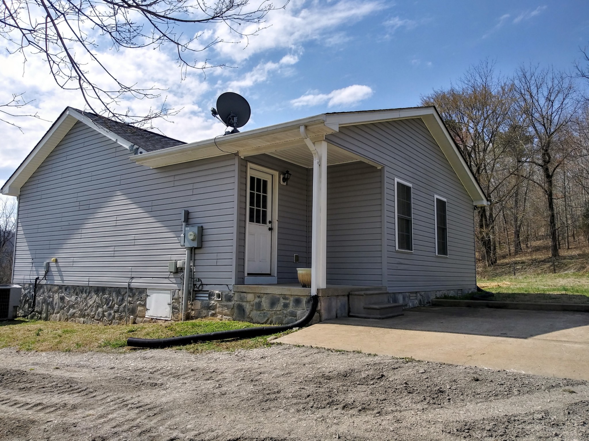 5330 Long Branch Road Tennessee Ridge, TN 37178 - Photo 48 of 57 a front view of a house with garden