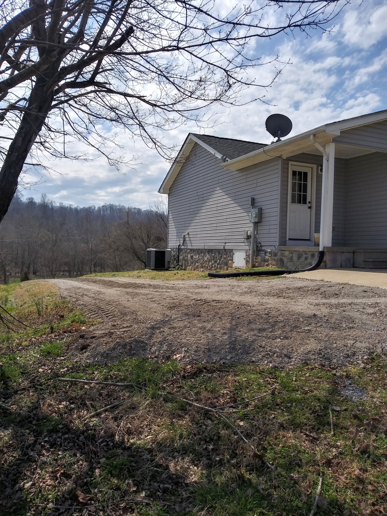 5330 Long Branch Road Tennessee Ridge, TN 37178 - Photo 50 of 57 a house with yard in front of it