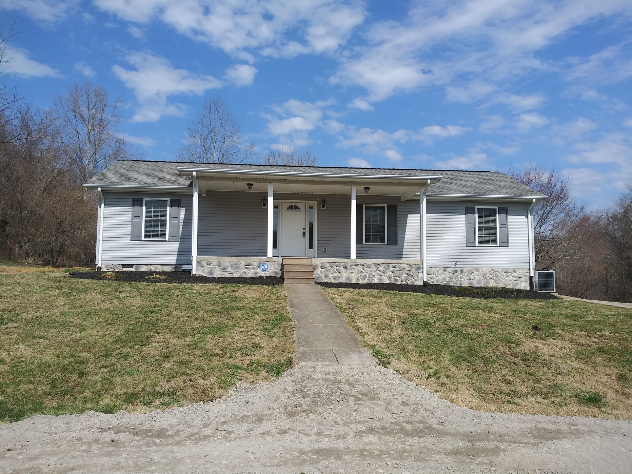 5330 Long Branch Road Tennessee Ridge, TN 37178 - Photo 57 of 57 a front view of a house with garden
