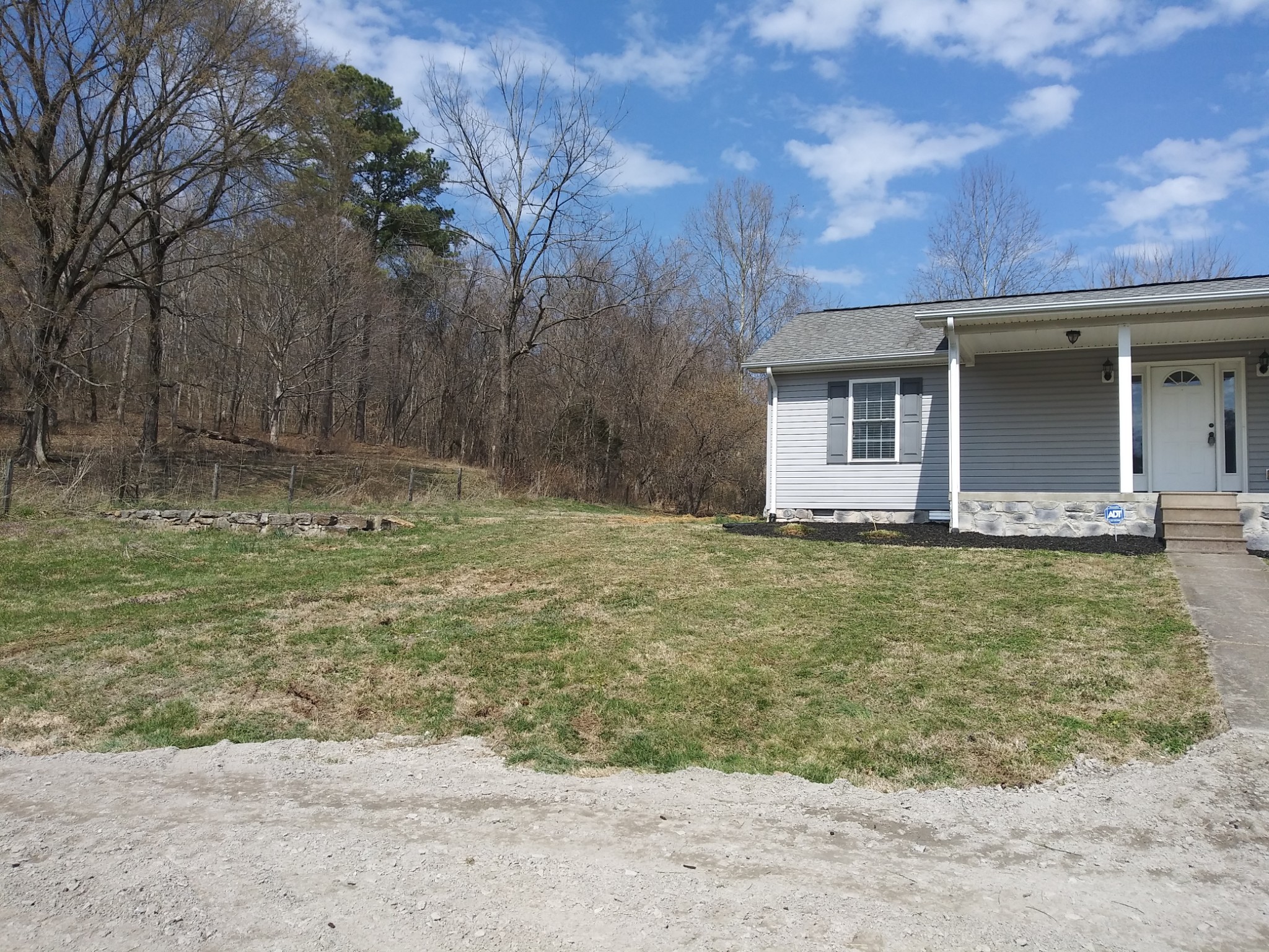 5330 Long Branch Road Tennessee Ridge, TN 37178 - Photo 6 of 57 a view of a house with a yard