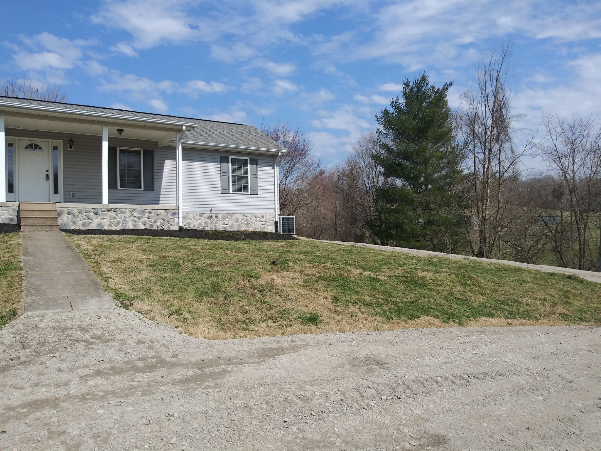 5330 Long Branch Road Tennessee Ridge, TN 37178 - Photo 8 of 57 a view of a house with a backyard