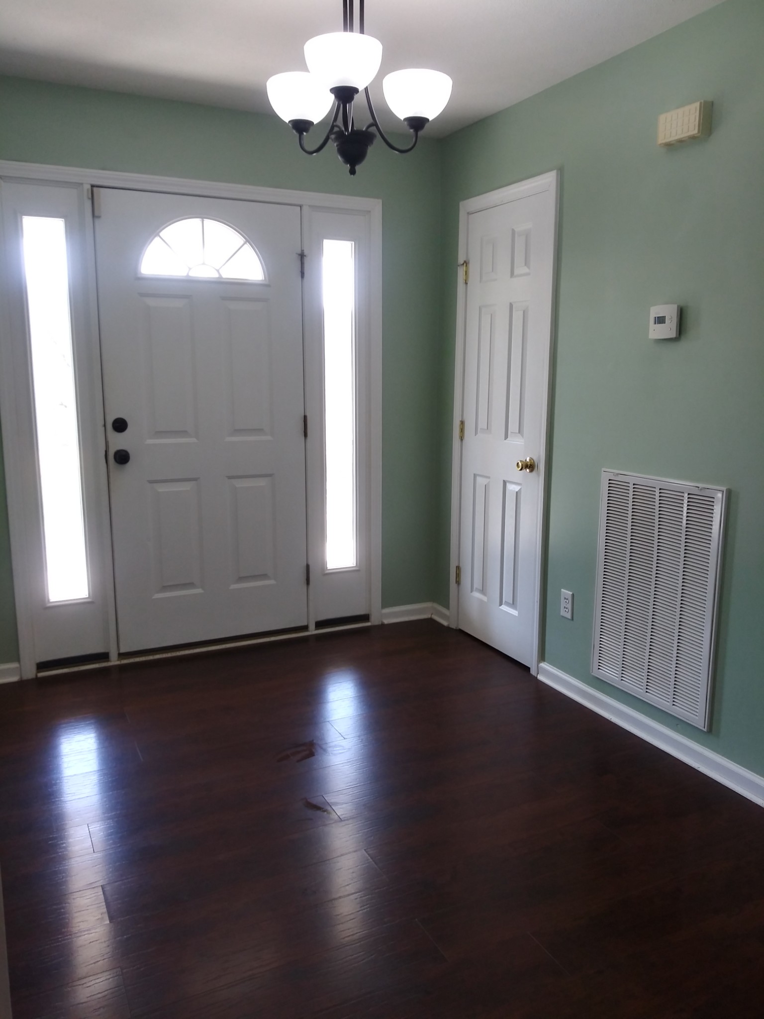 5330 Long Branch Road Tennessee Ridge, TN 37178 - Photo 10 of 57 a view of wooden floor and windows in a room