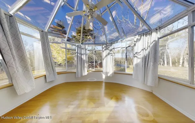 a view of swimming pool with a outdoor seating space