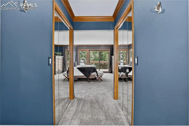 an entryway and livingroom with furniture