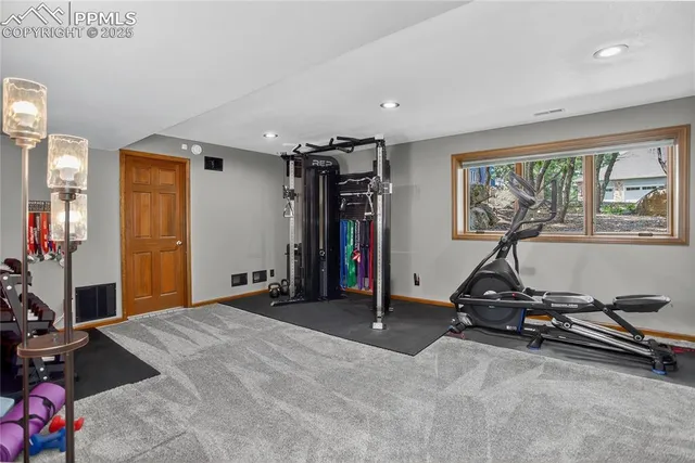 a view of a room with gym equipment