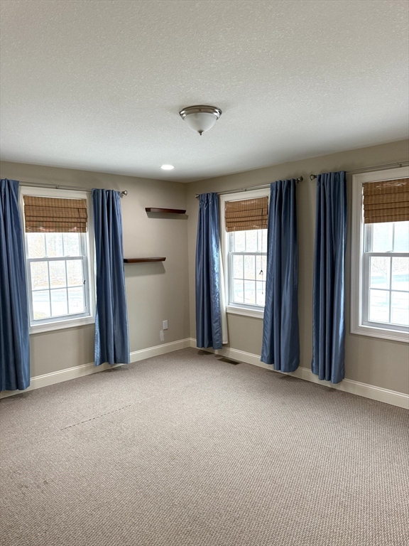 134 Granger Street Springfield, MA 01119 - Photo 11 of 15 an empty room with windows and closet