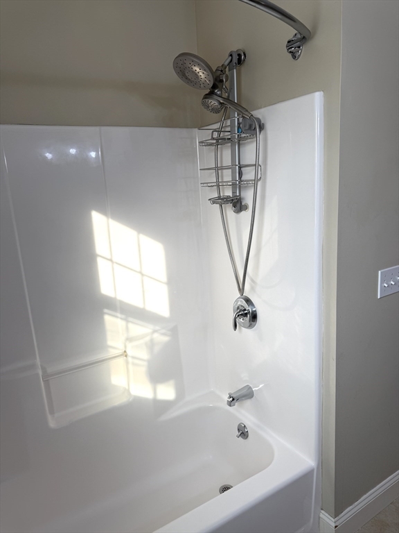 134 Granger Street Springfield, MA 01119 - Photo 13 of 15 a bathroom with a bathtub