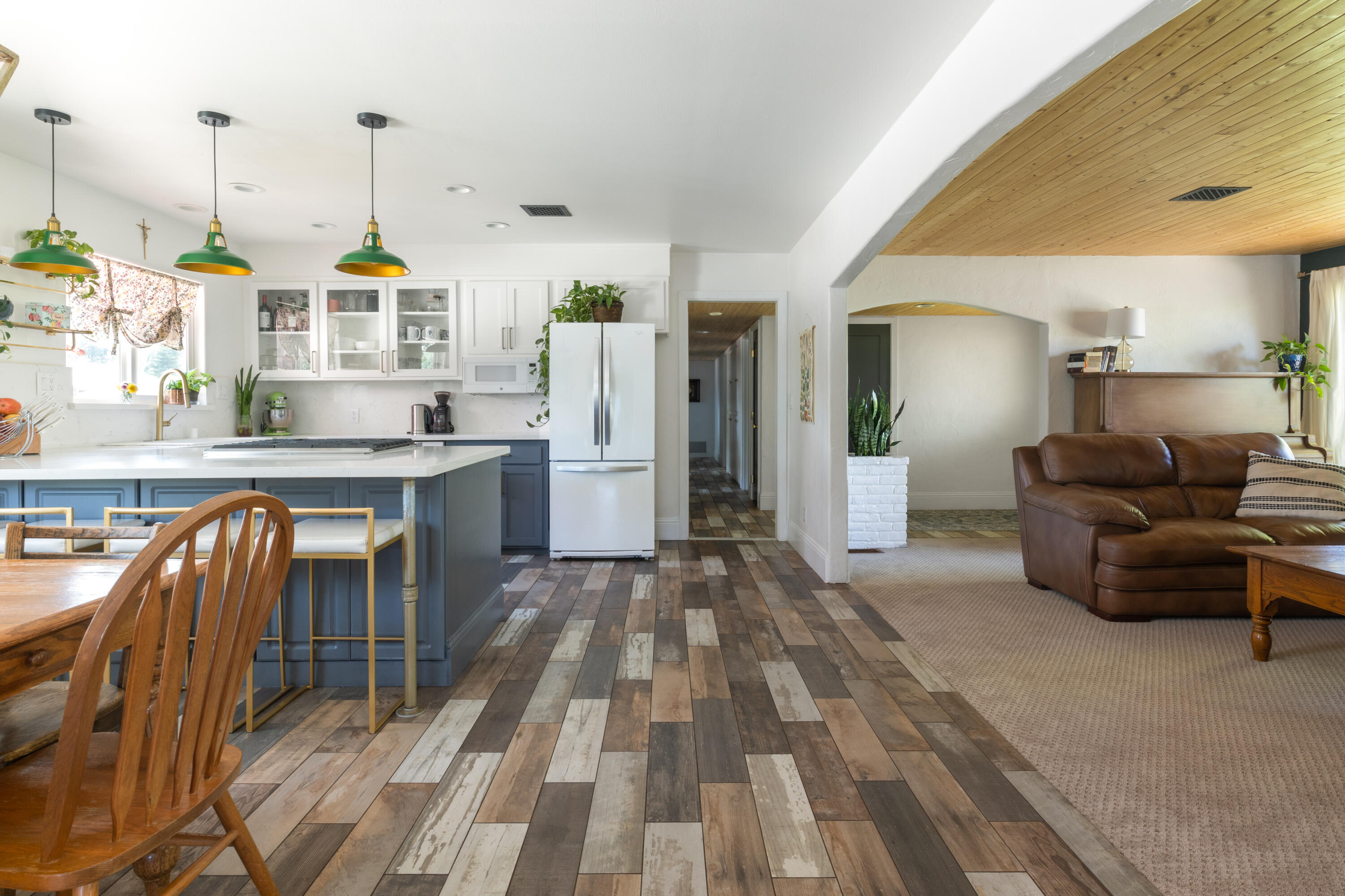 4001 Alta Mesa Drive Redding, CA 96002 - Photo 18 of 42 a living room with stainless steel appliances kitchen island granite countertop furniture and a kitchen view