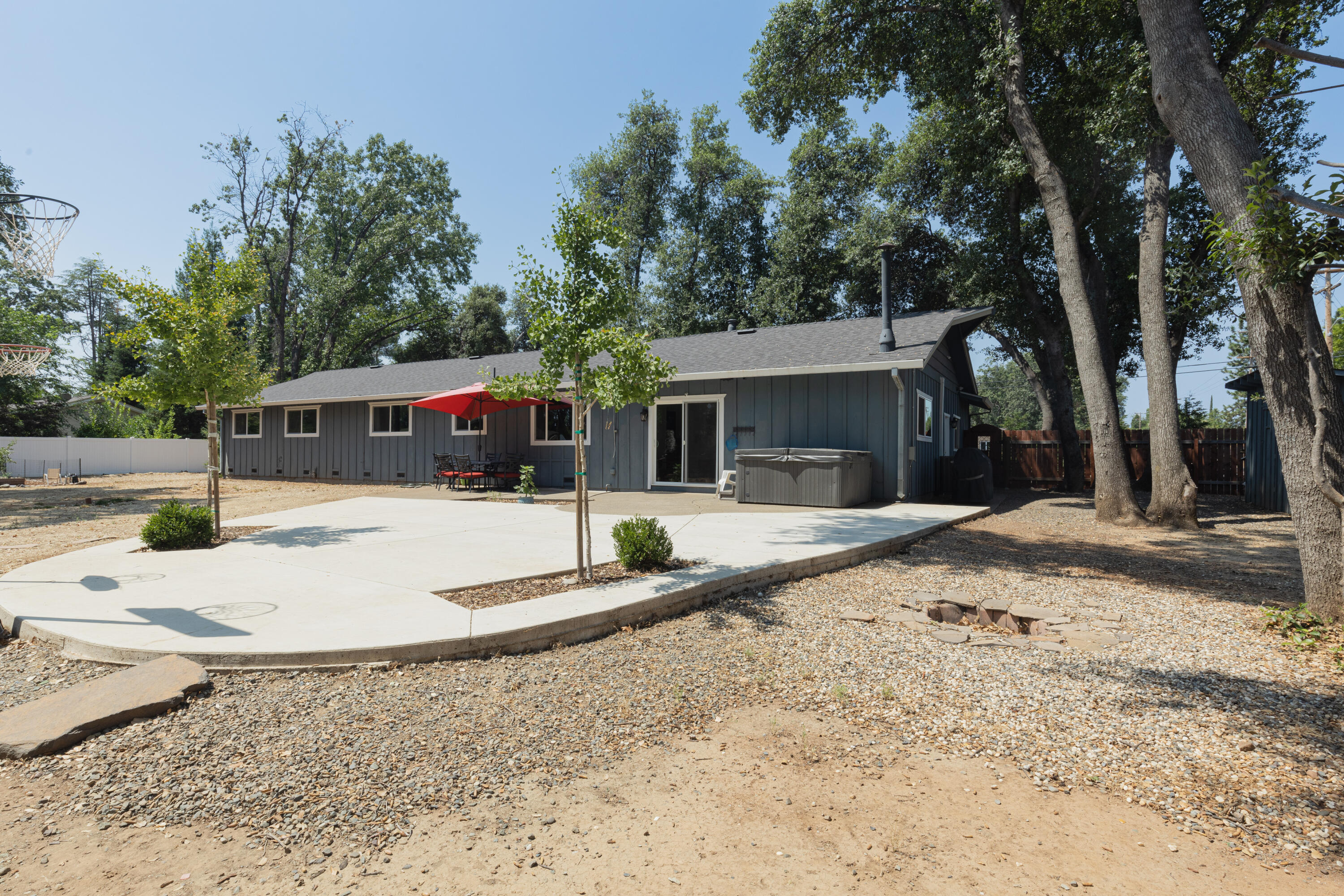 4001 Alta Mesa Drive Redding, CA 96002 - Photo 30 of 42 a view of a house with a yard and large tree