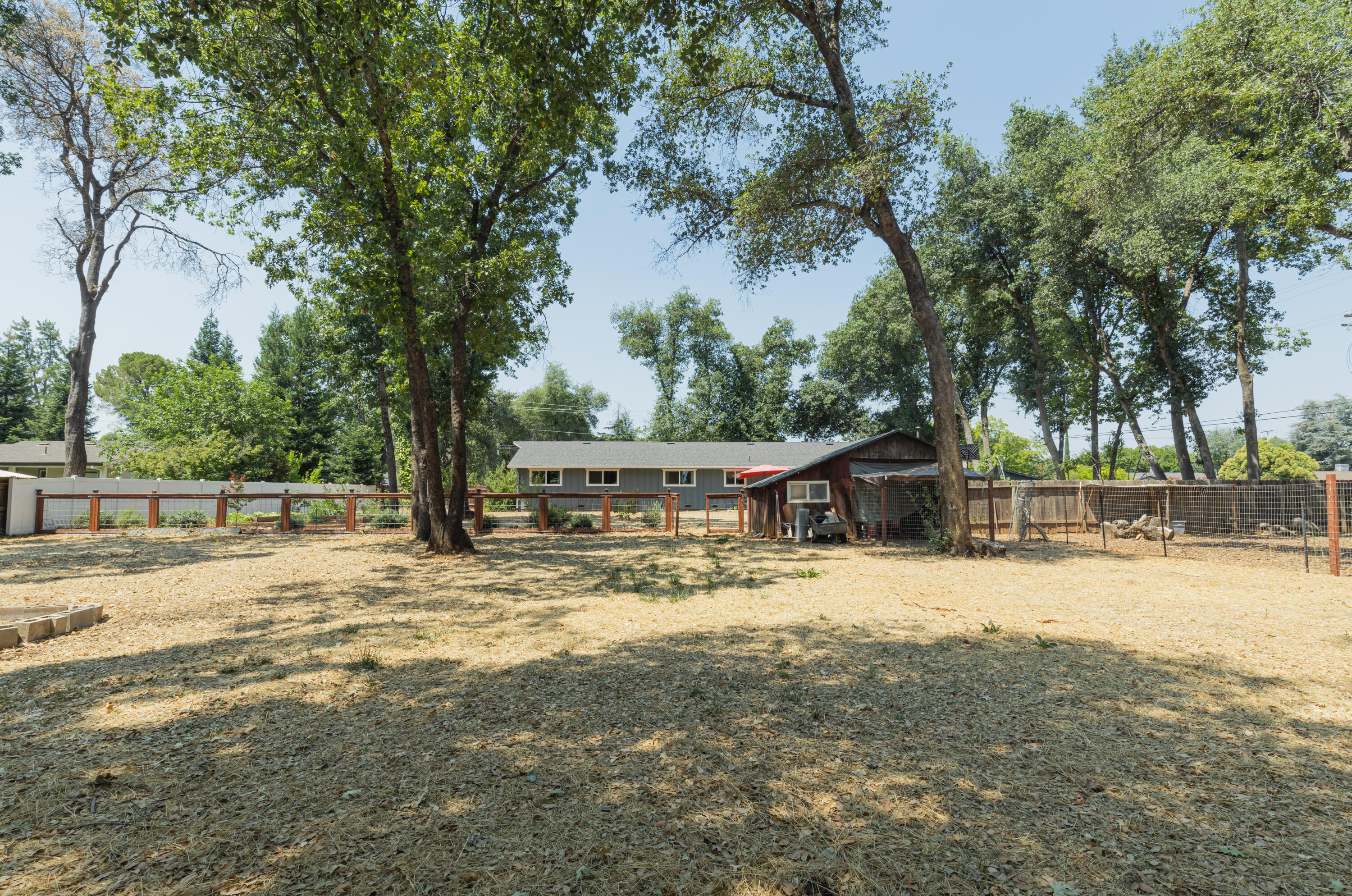 4001 Alta Mesa Drive Redding, CA 96002 - Photo 36 of 42 a view of a house with a yard covered in snow