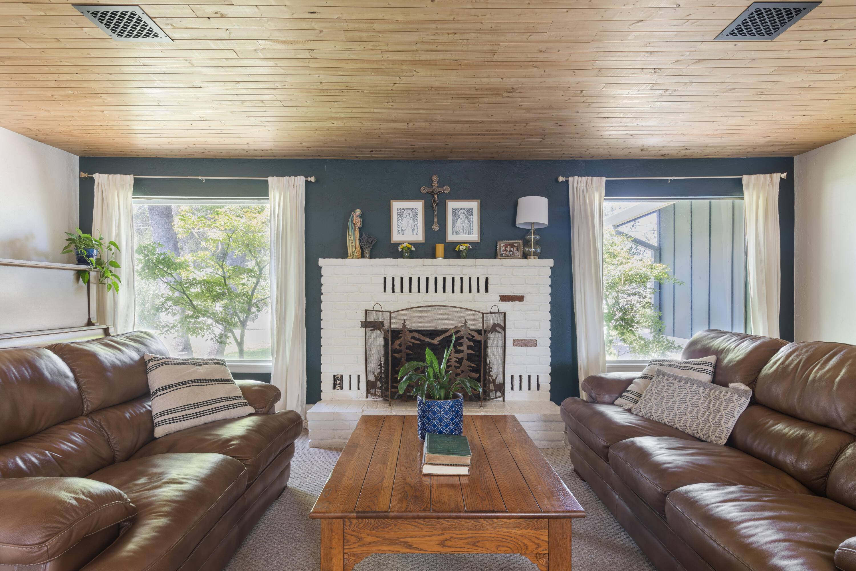 4001 Alta Mesa Drive Redding, CA 96002 - Photo 7 of 42 a living room with furniture and a fireplace