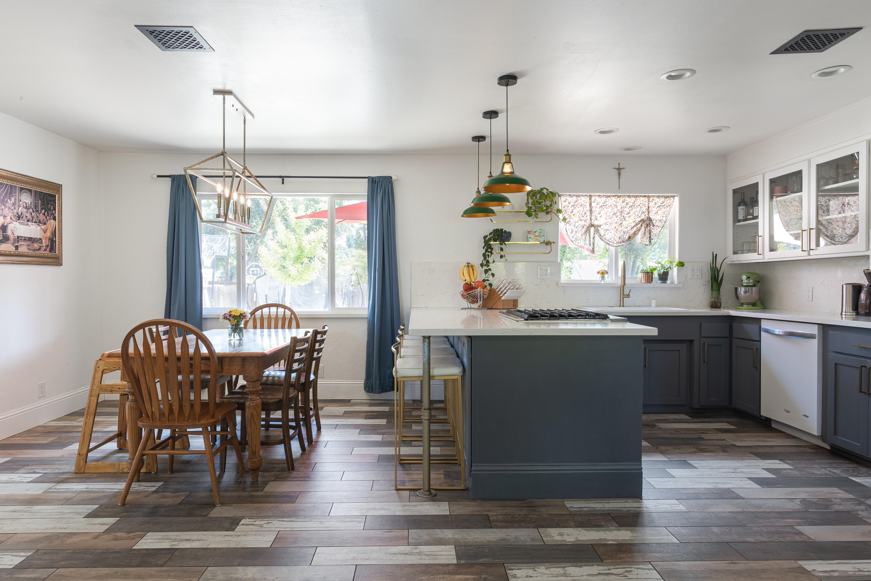 4001 Alta Mesa Drive Redding, CA 96002 - Photo 8 of 42 a dining room with granite countertop a table and chairs