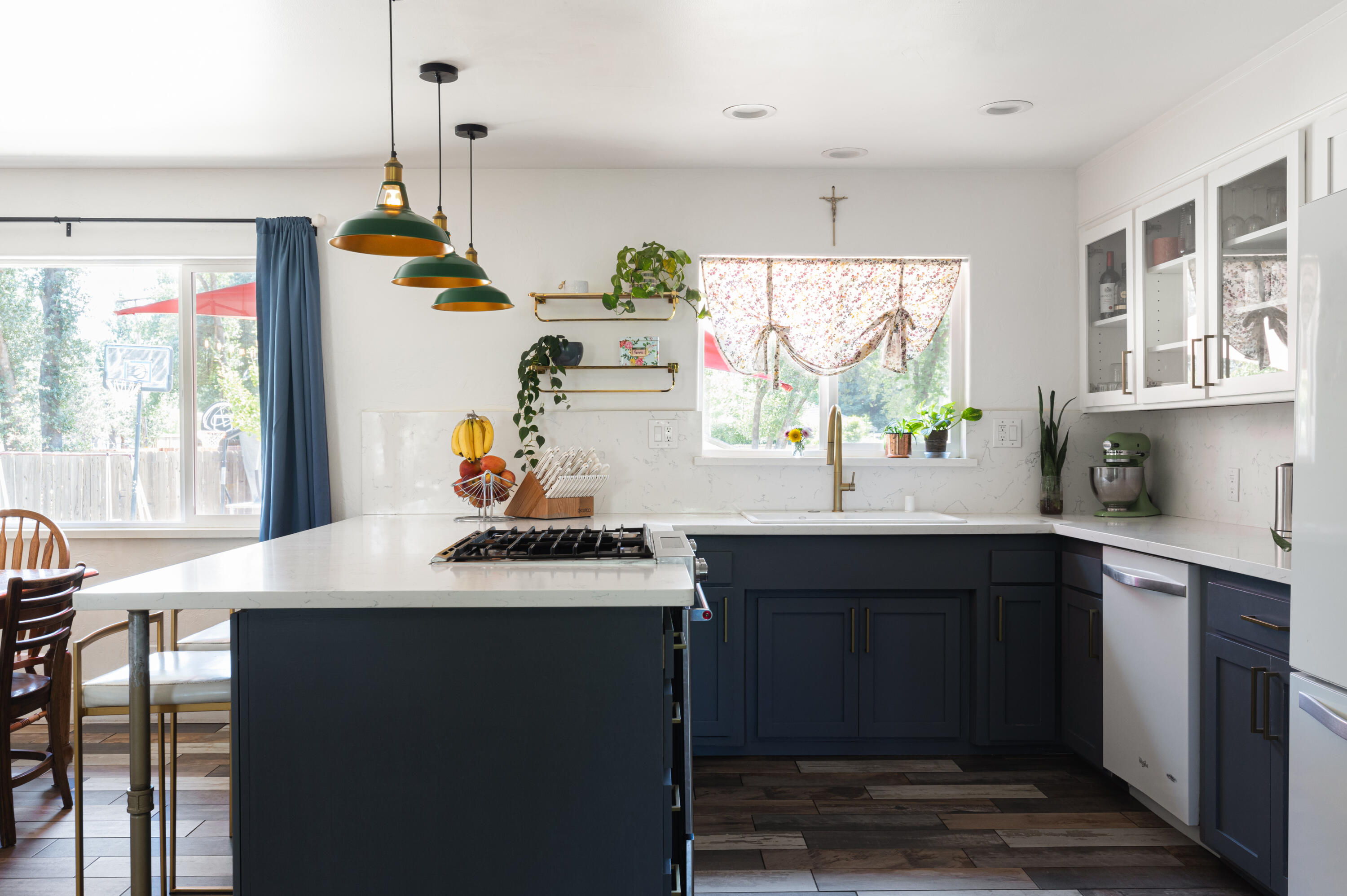 4001 Alta Mesa Drive Redding, CA 96002 - Photo 9 of 42 a kitchen with a sink a window and cabinets