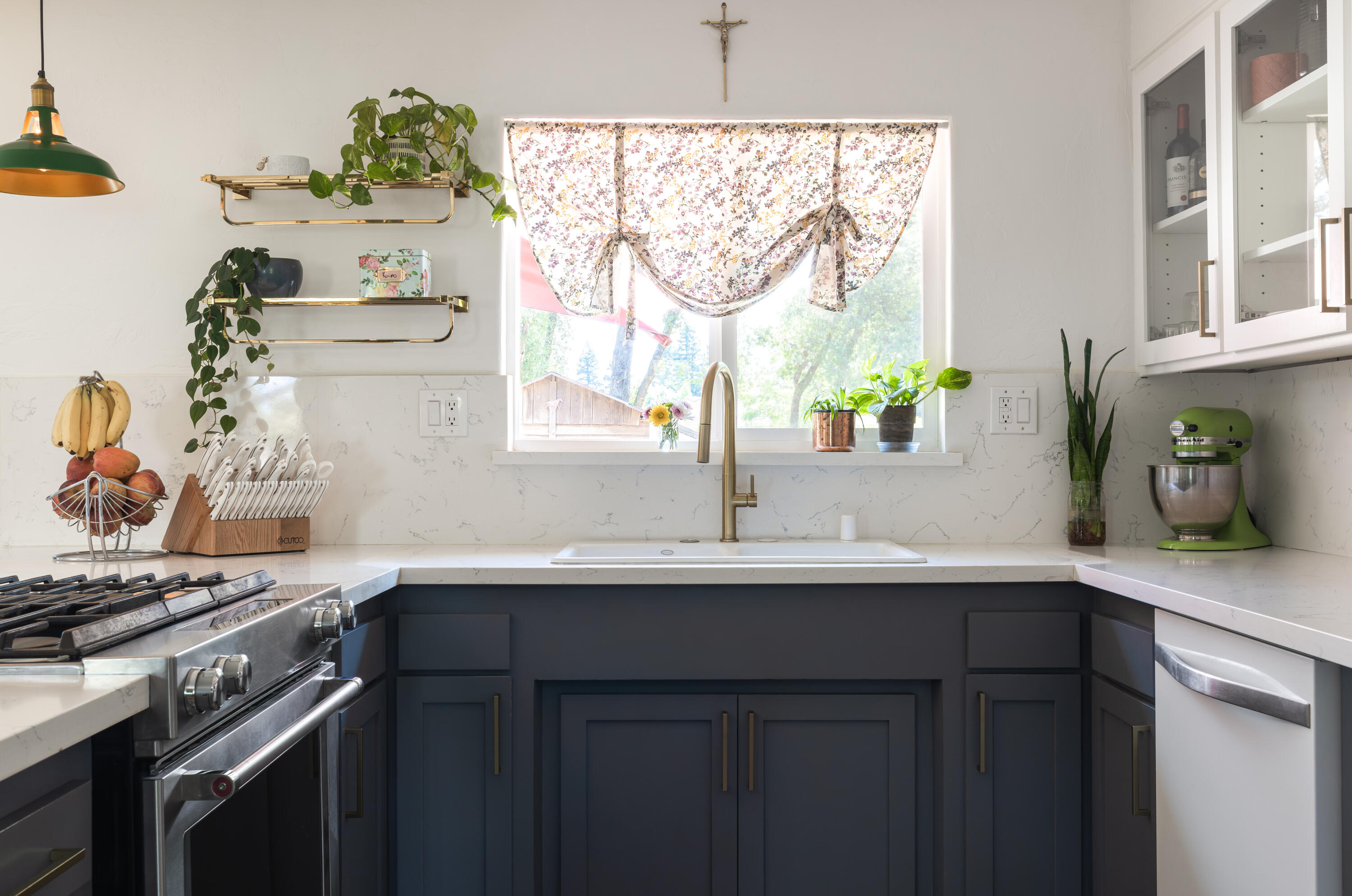 4001 Alta Mesa Drive Redding, CA 96002 - Photo 10 of 42 a kitchen with a sink stove and cabinets