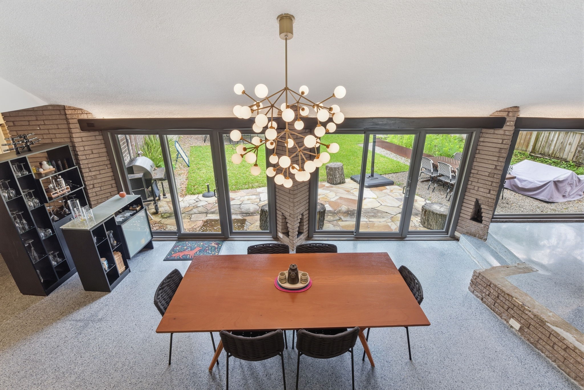 4603 Ivanhoe Street Houston, TX 77027 - Photo 27 of 50 a dining room with furniture a chandelier and window
