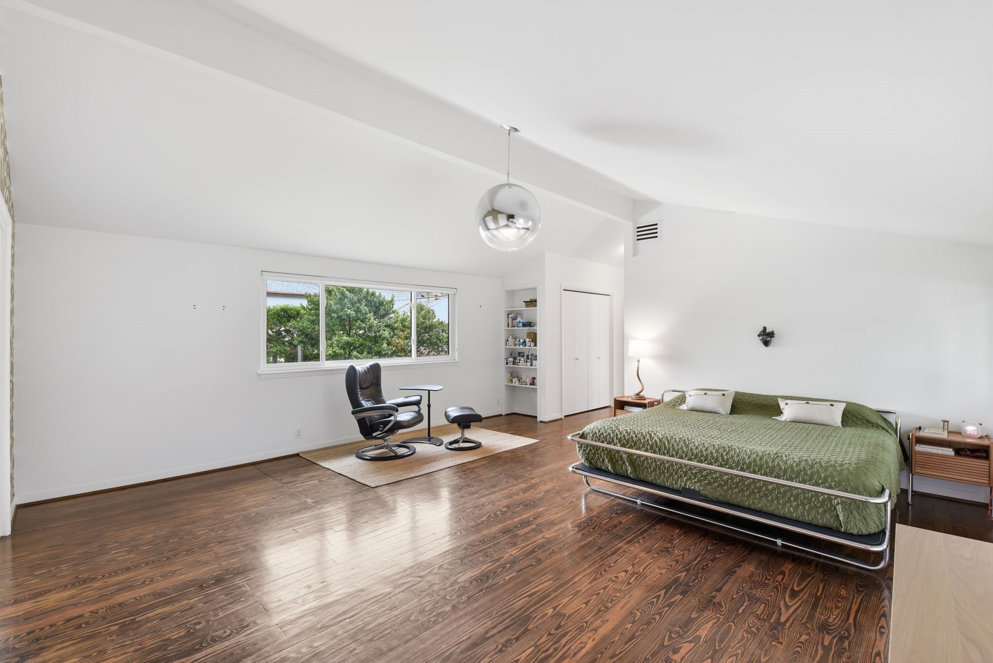 4603 Ivanhoe Street Houston, TX 77027 - Photo 33 of 50 a living room with a bed furniture and a large window