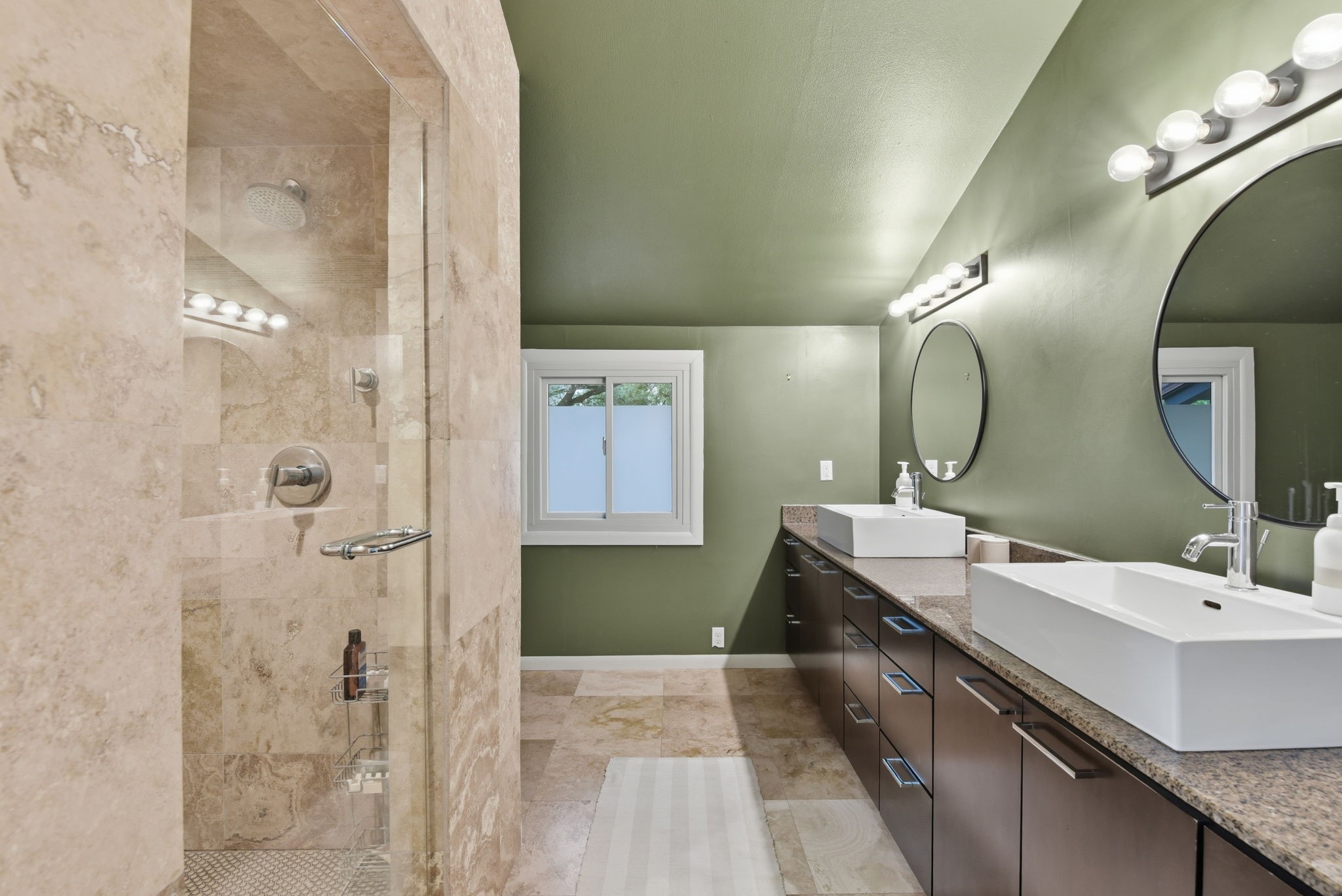 4603 Ivanhoe Street Houston, TX 77027 - Photo 34 of 50 Spa-like bath featuring natural stone and a calming, elevated palette