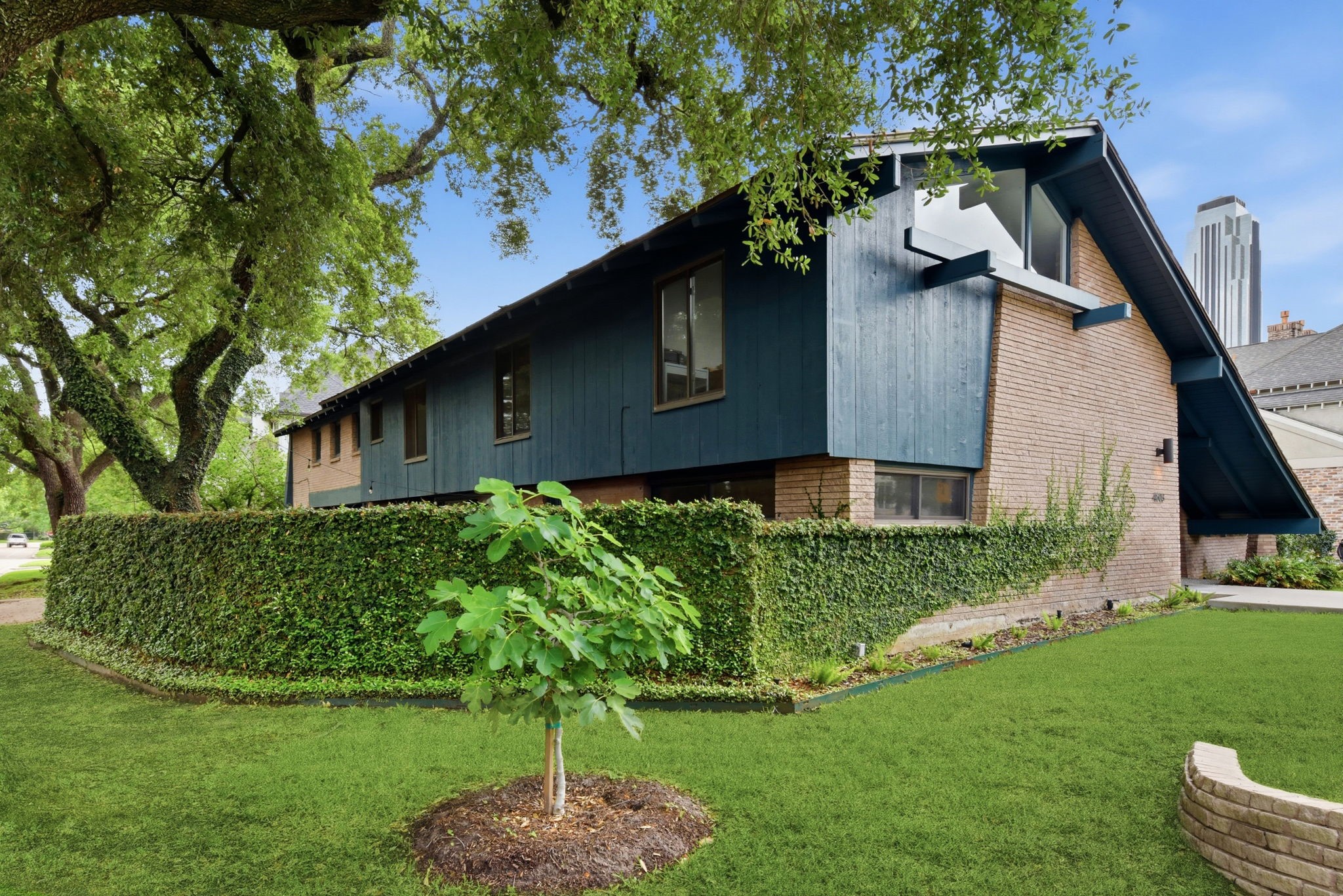 4603 Ivanhoe Street Houston, TX 77027 - Photo 46 of 50 a front view of a house with a yard