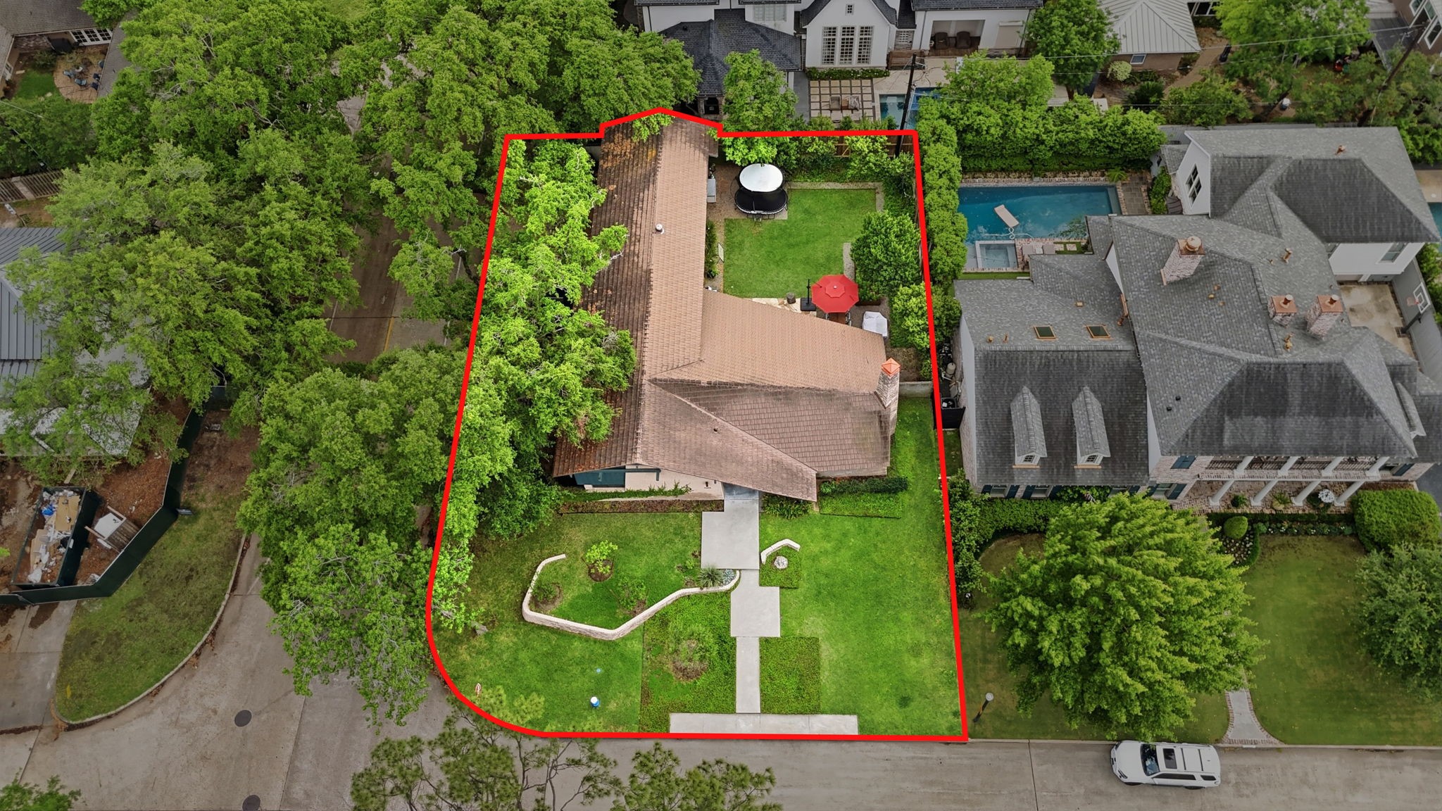 4603 Ivanhoe Street Houston, TX 77027 - Photo 48 of 50 an aerial view of a house with a yard and lake view