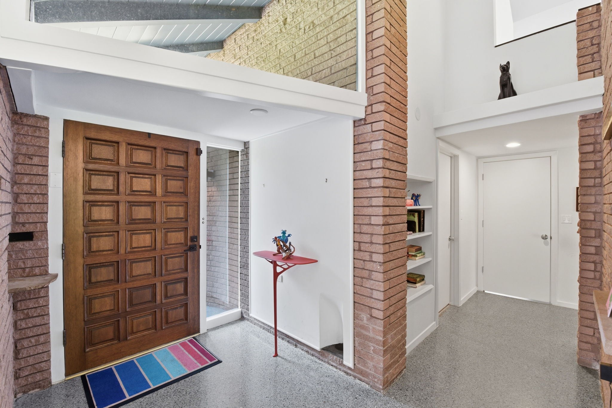 4603 Ivanhoe Street Houston, TX 77027 - Photo 6 of 50 Welcoming foyer with original terrazzo flooring and clean modern lines