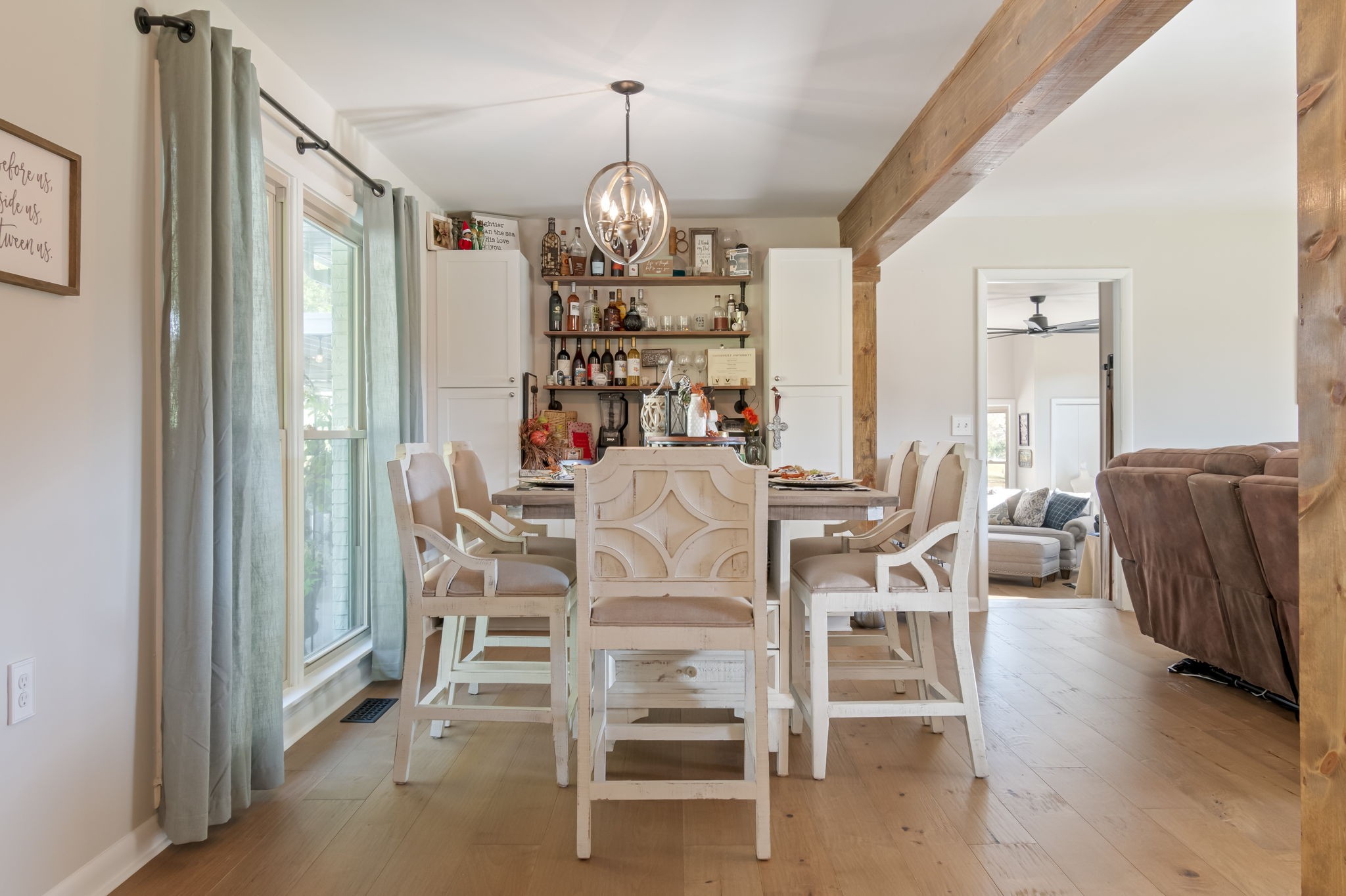 260 West Fork Road Mount Pleasant, TN 38474 - Photo 14 of 54 a view of a dining room with furniture wooden floor and chandelier