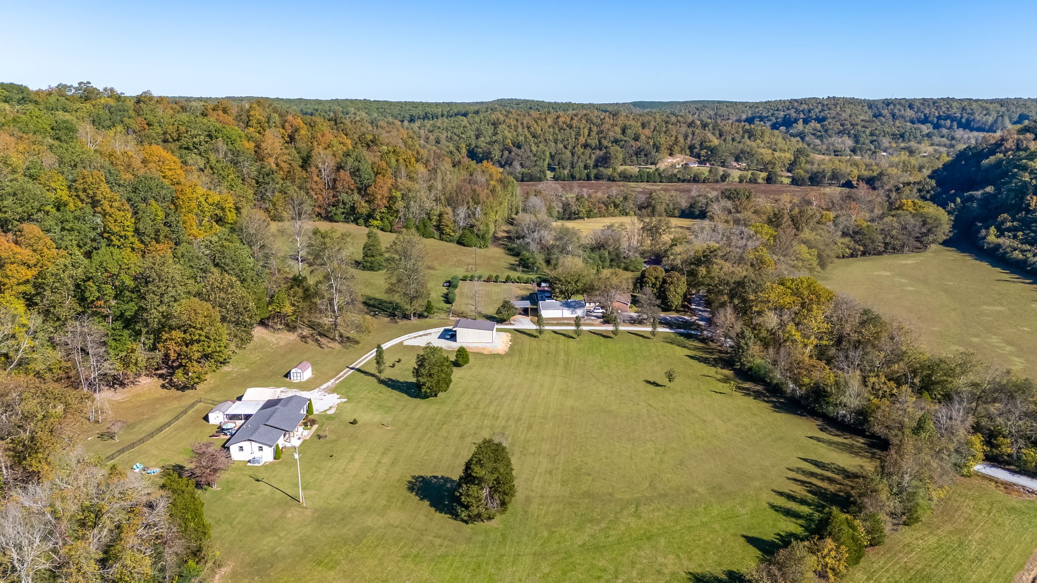 260 West Fork Road Mount Pleasant, TN 38474 - Photo 23 of 54 an aerial view of residential houses with outdoor space