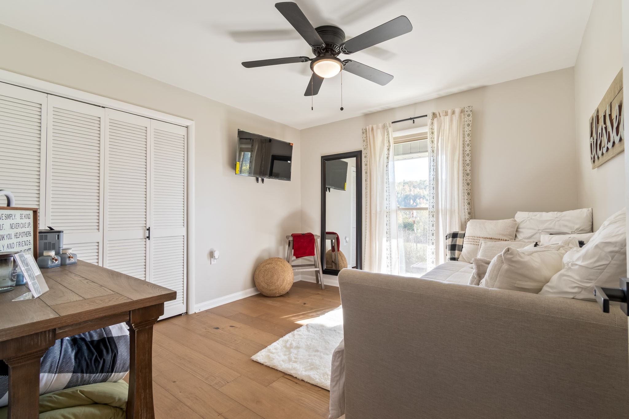 260 West Fork Road Mount Pleasant, TN 38474 - Photo 26 of 54 a bedroom with furniture and a window