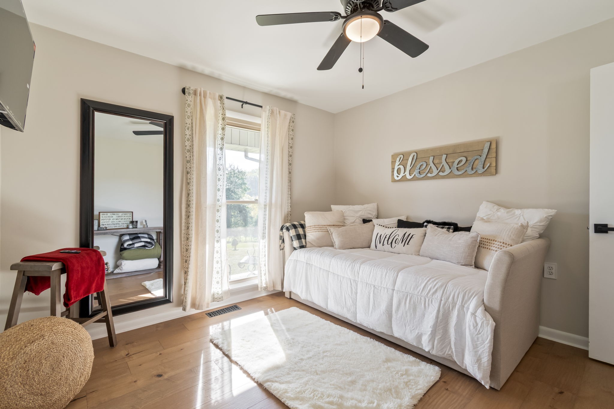 260 West Fork Road Mount Pleasant, TN 38474 - Photo 27 of 54 a bedroom with a bed and window