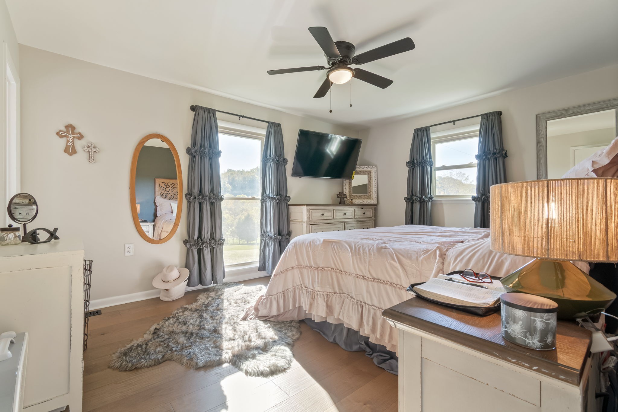 260 West Fork Road Mount Pleasant, TN 38474 - Photo 35 of 54 a bedroom with a bed and dresser with mirror