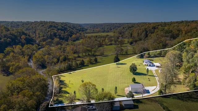 a view of a balcony with floor to ceiling windows