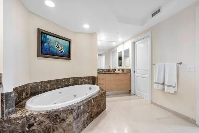 a bedroom with bed and window