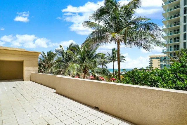 a living room with fireplace furniture and a flat screen tv