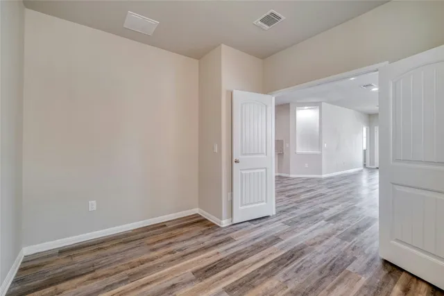 an empty room with windows