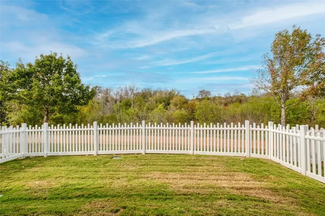front view of a house and a yard